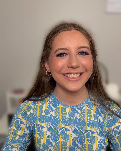 Bright daytime makeup with a glossy lip