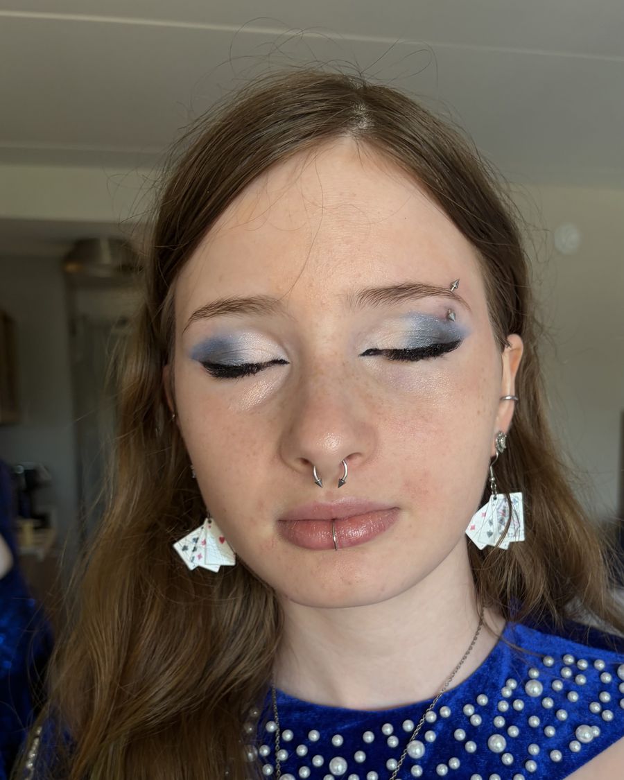 Close detail of a smoky eye, eyes lowered
