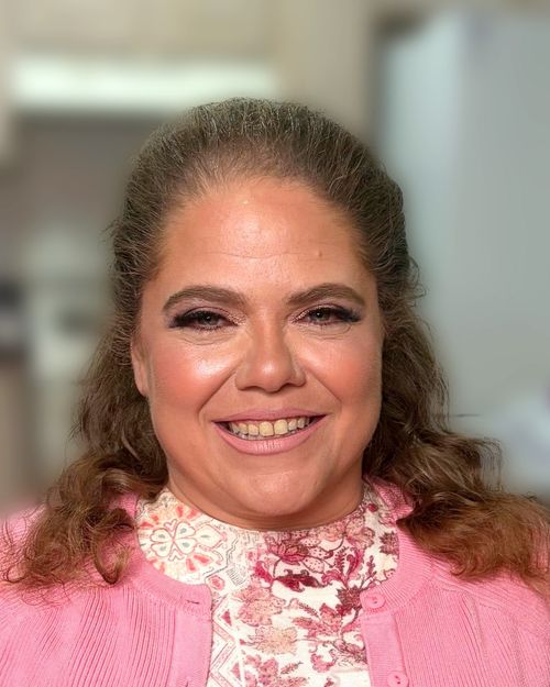 Full evening makeup with a warm lip