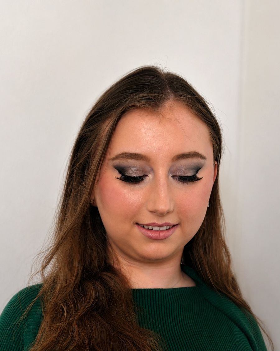 Soft glam with a lifted eye, eyes lowered