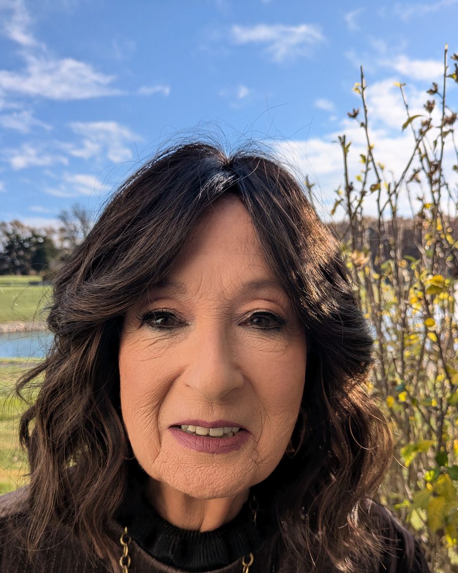 Occasion makeup for a mature client, photographed outdoors